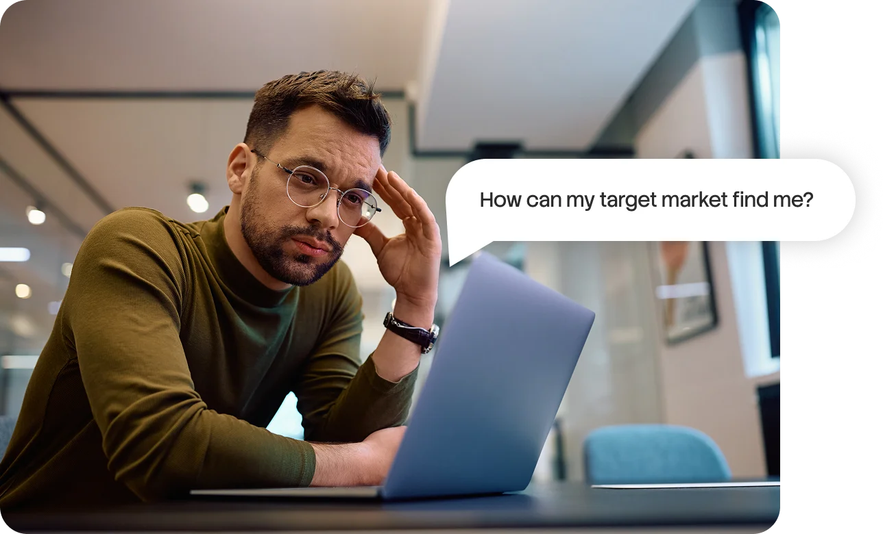 Business owner looking stressed at his laptop, worried his target market can't find him online